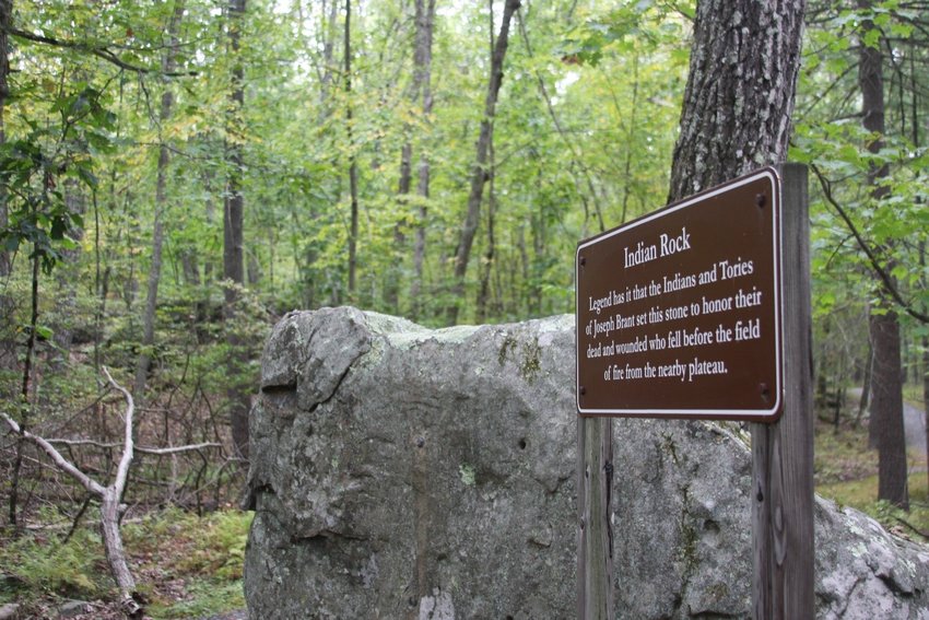 The stone that supposedly commemorates the Iroquois and Loyalist dead at Minisink Battleground Park.